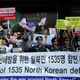 North Korea defectors stage an anti-North Korea protest in South Korea in September 2017
